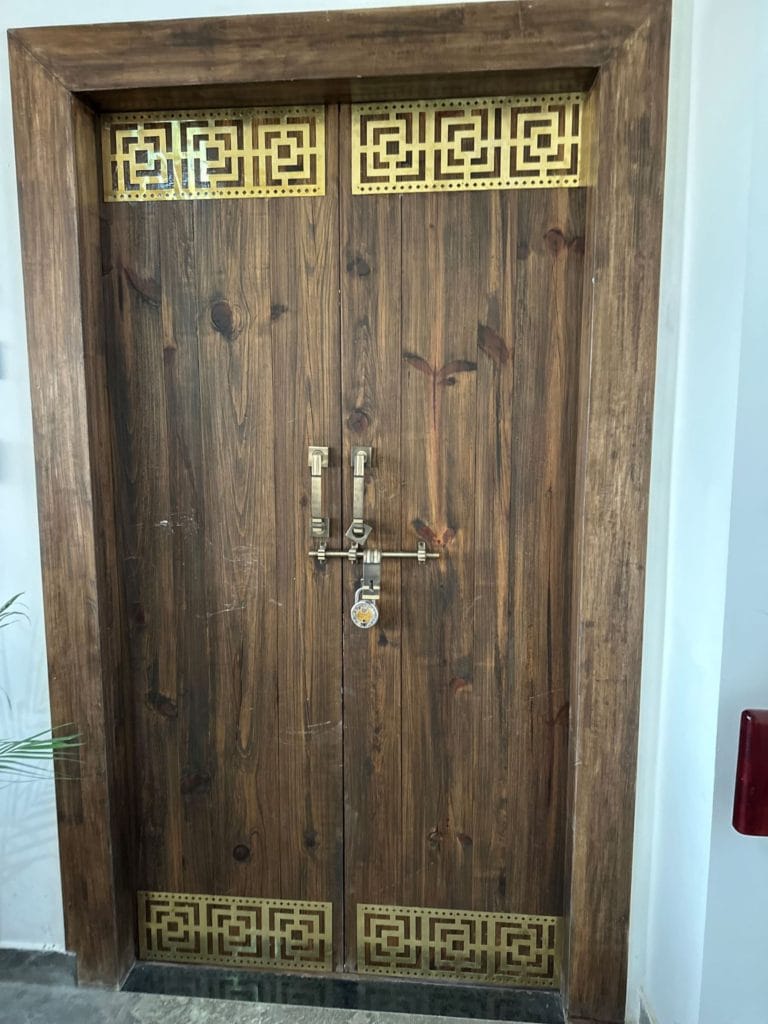 Resurgence Travel trekking Nepal - nice door at Hotel Mustang