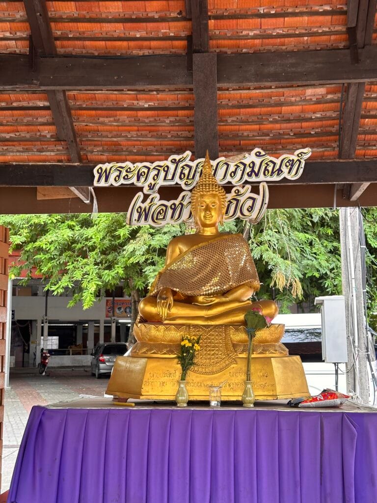 Buddha statue at Wat Khlong Rian on the road with Resurgence Travel