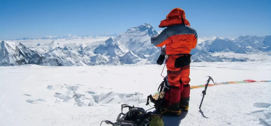 High-altitude mountaineer overlooking Mount Everest during a trekking expedition in Nepal