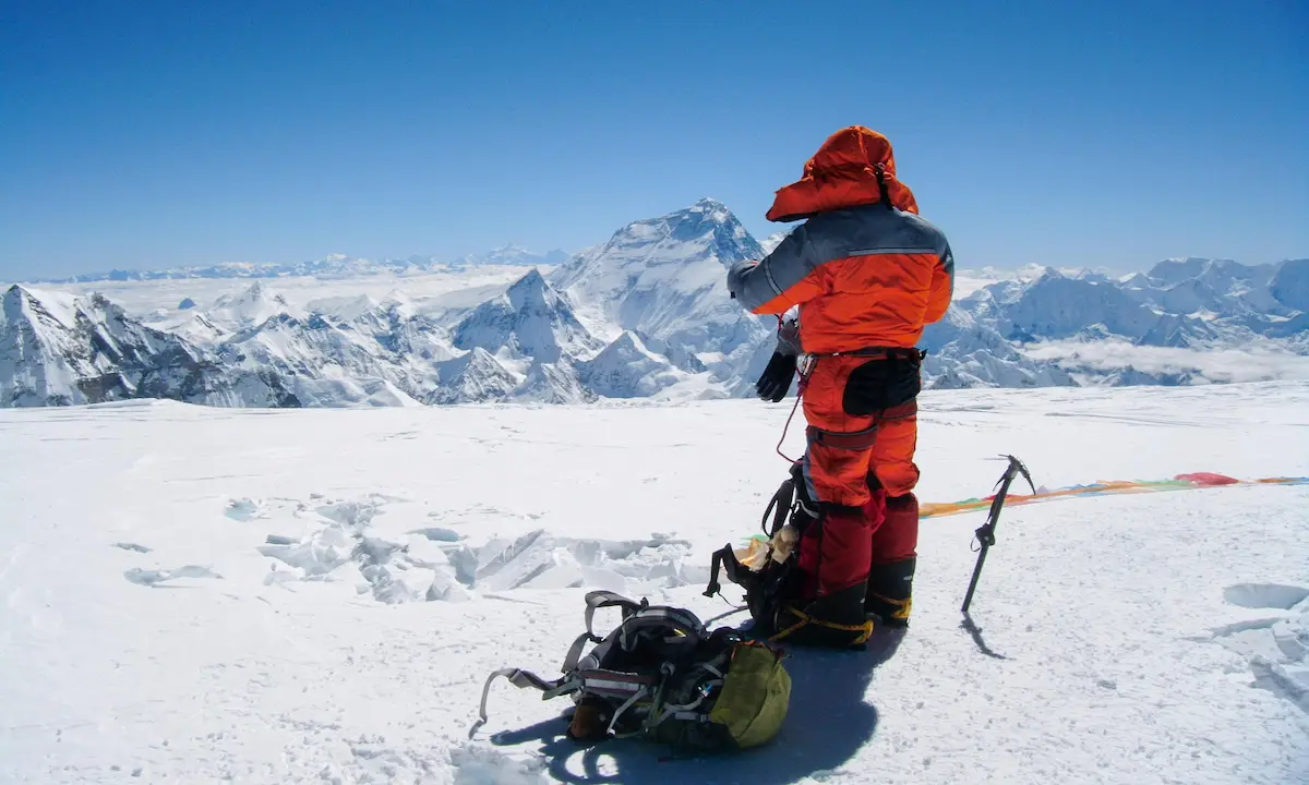 High-altitude mountaineer overlooking Mount Everest during a trekking expedition in Nepal