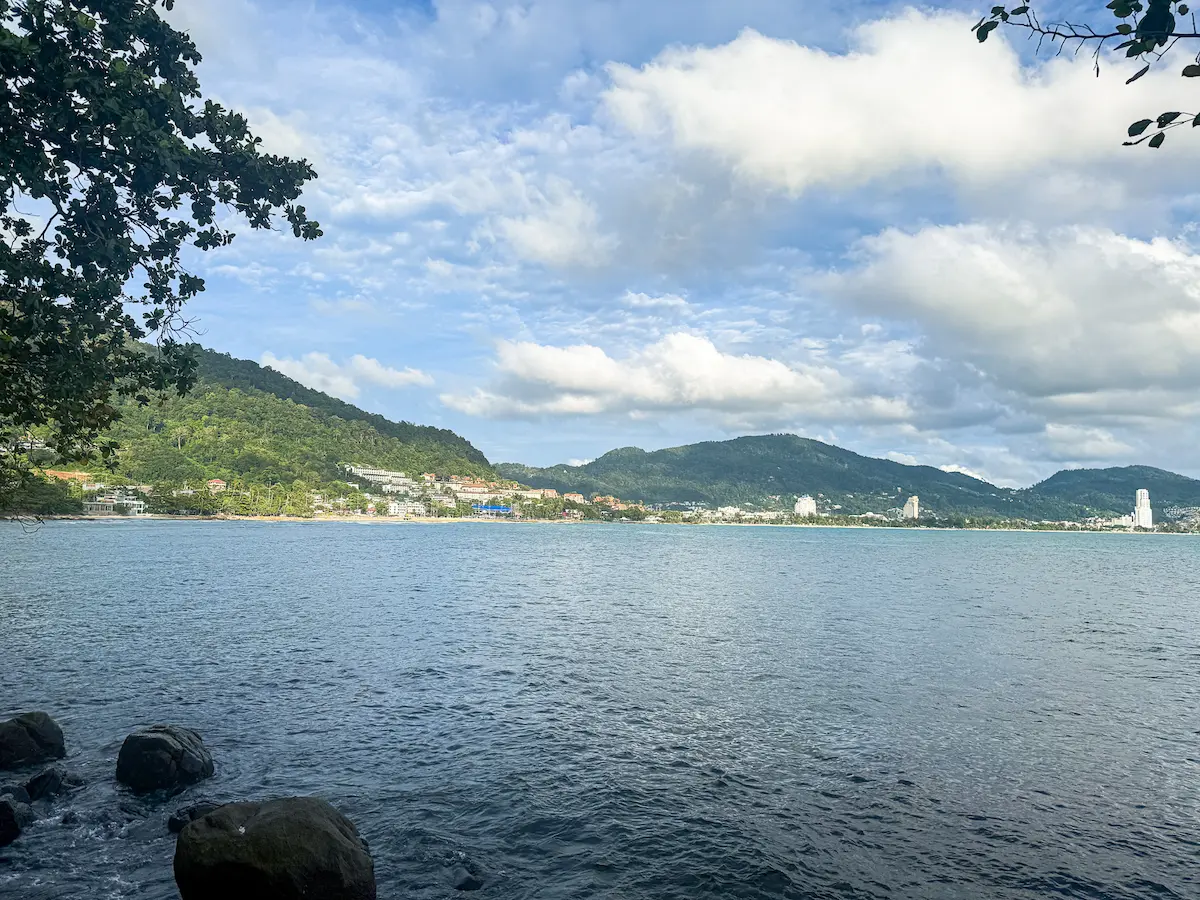 View of Patong Bay showing jungle and modern city skyline