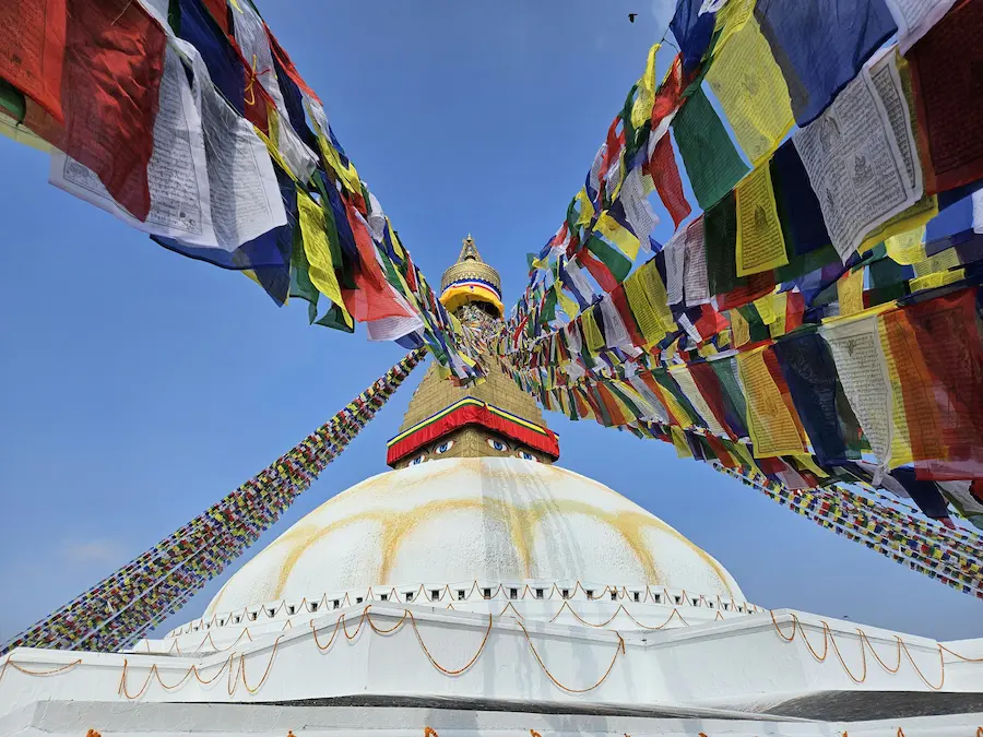 Prayer flags at Boudhanath Stupa, Kathmandu — classic Nepal trekking spirit