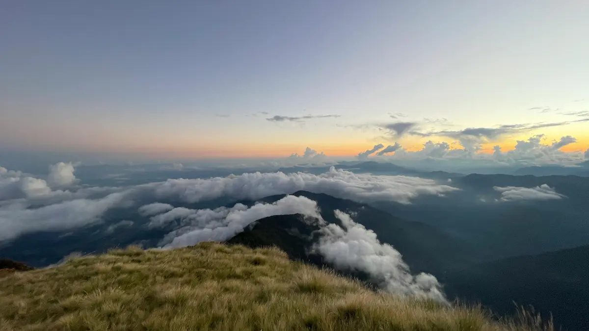 Clouds lifting over Himalayan ridges at first light in Nepal seasons